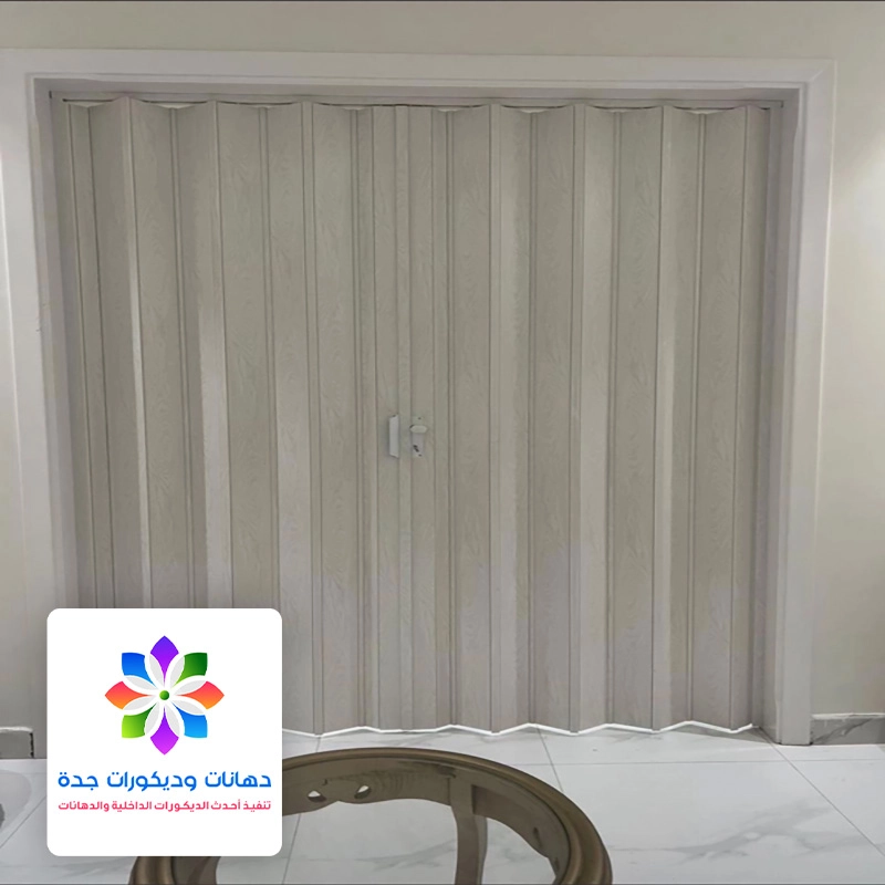 معلم تركيب باب اكورديون بجدة